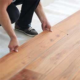 Man installing hardwood flooring | Joseph's Flooring