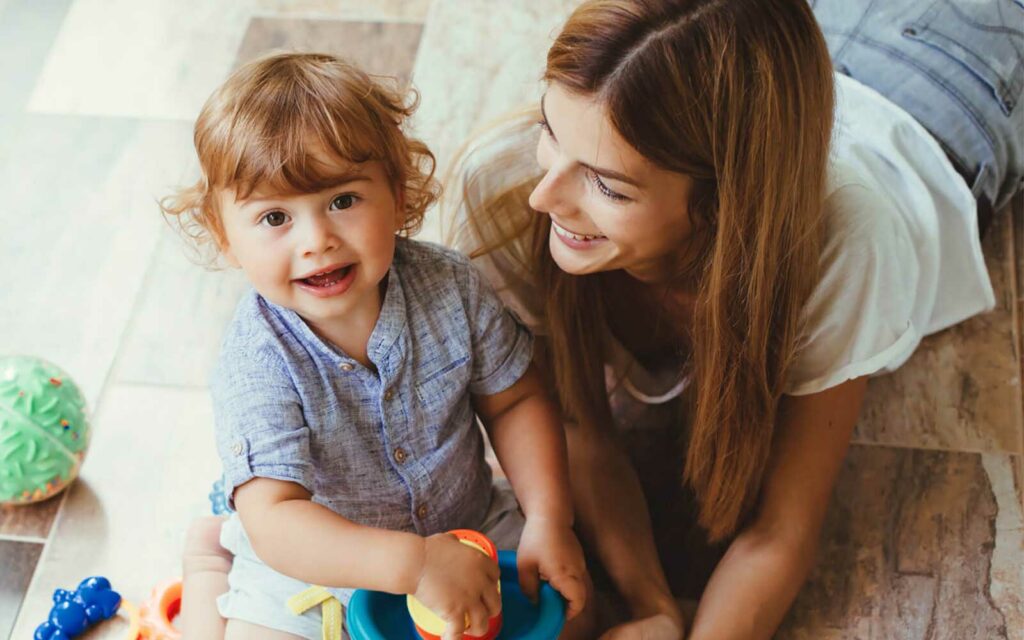 Happy mom and child playing together | Joseph's Flooring